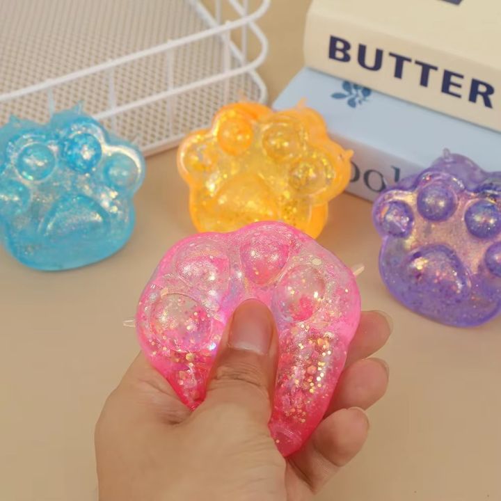 Cat%20Paw%20Taba%20Squishy%20Toy%20%E2%80%93%20Ultra-Soft%20Stress%20Relief%20Squeeze%20Toy%20with%20Quick%20Recovery,%20Cute%20Cat%20Paw%20Design,%20Mix%20Colors%20-%20Image%203
