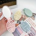 Portable Folding Hair Comb with Mirror, Lightweight & Travel-Friendly for On-the-Go Styling. A Perfect  for Women & Girls.. 