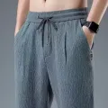 Summer Nine-minute Pants Ultra-thin Section Ice Silk Cool Trend Loose Cotton Linen Casual Pants Straight Linen Pants Men Summer. 