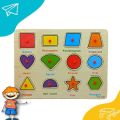 Wooden Puzzle Shapes Board With Colour. 