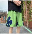 Mai Lang floral shorts are 3 dark green/light green/black. fabric is suitable for water activities, chill, beach or even falls.. 