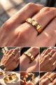 Stainless Steel Golden coloured trendy design finger ring.