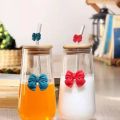 Transparent Bow Glass Cup with Bamboo Lid & Straw – Perfect for Juice, Coffee & Smoothies (Random color). 