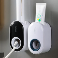 Automatic Toothpaste Dispenser Wall Mounted Toothpaste Squeezers Dust-proof Toothpaste Holder. 