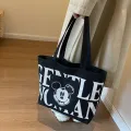 Disney Large Capacity Canvas Bag Women's 2024 New Trendy Cartoon Mickey Tote Bag College Student Class Shoulder Tote Bag. 