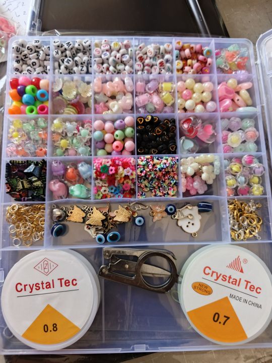DIY%20Bead%20Bracelet%20Making%20Kit%20%E2%80%93%2027-Grid%20Box%20with%20Colorful%20Beads,%20Alphabet%20Letters,%20Elastic%20String,%20Charms%20&%20Scissors%20%7C%20Jewelry%20Craft%20Set%20for%20Kids%20&%20Adults%20-%20Image%202