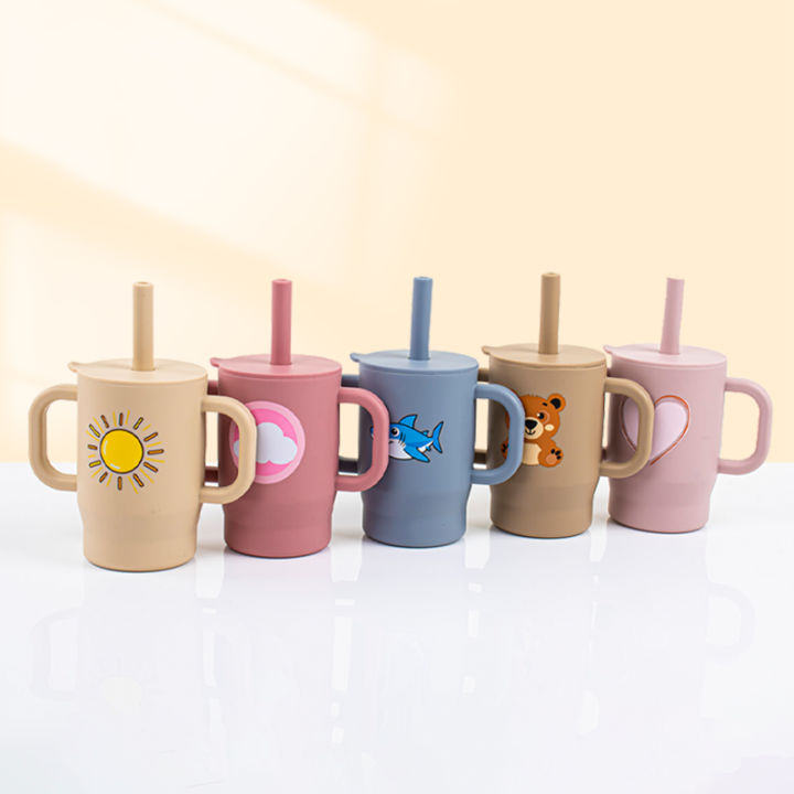 Silicone%20180ml%20Baby%20Learning%20Drinking%20Cup%20with%20Handle%20and%20Straw%20Training%20Cup,%20Cartoon%20Printed%20Leak-Proof%20Baby%20Water%20Cup%20-%20Image%202