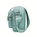 Lightweight Nylon Chic Crossbody Bag for Women - Adjustable Strap, Zip Closure, Tassel Accent, Solid Color.