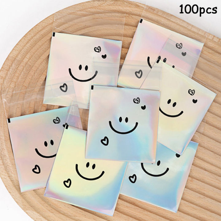 100pcs%20Cute%20Smiling%20Face%20Cookie%20Packaging%20Bag%20Laser%20Transparent%20Biscuit%20Bag%20Self-adhesive%20Bag%20Birthday%20Party%20Wedding%20Decoration%20-%20Image%207