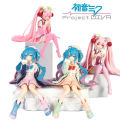 Anime Hatsune Miku Anime figure Pink dress Sitting posture PVC model action toys Cherry pink cherry blossom decorations. 