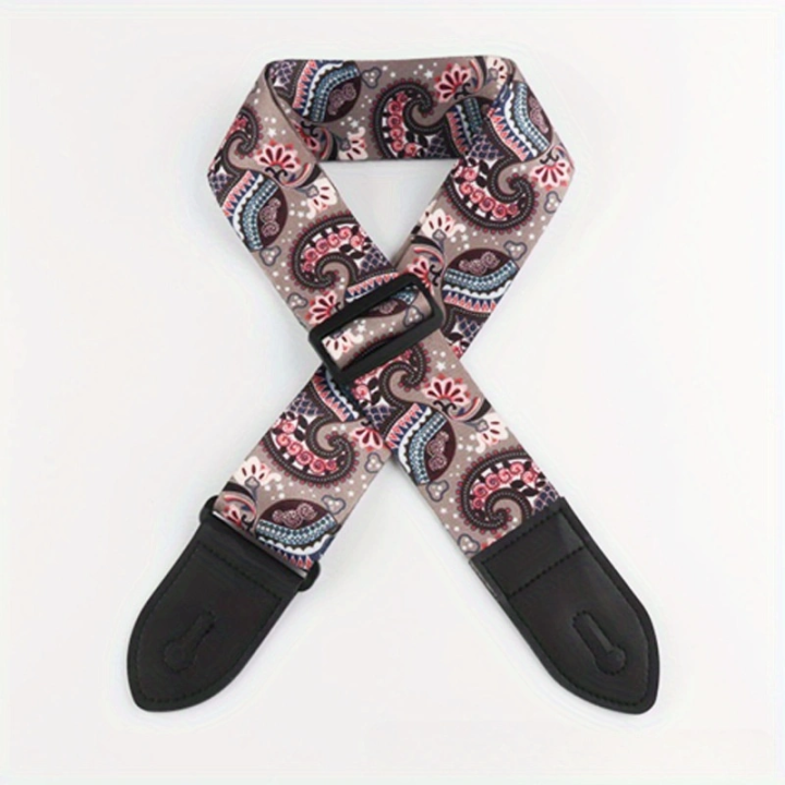 The%20guitar%20strap%20is%20fashionable%20and%20versatile.%20It%20features%20geometric%20patterns%20and%20ethnic%20styles%20-%20Image%207