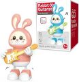 Electronic Dancing Rabbit Guitarist with Music Flashing Lights, 360 Degree Rotating and Sensing Interactive Fun Toy for Children (Color May Vary). 
