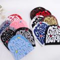 New European and American Popular Acrylic Material GR Letter Jacquard Outdoor Fashion Knitted Hat for Men and Women Beanie Hat.