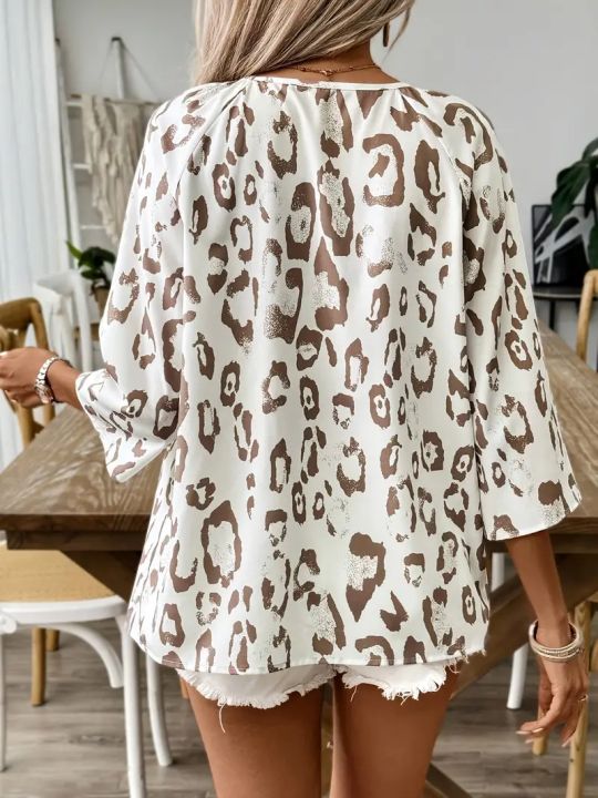 Plus%20Size%20Women%20Leopard%20Print%20Deep%20V-Neck%20Blouse%20Shirt%20Ladies%203/4%20Sleeve%20Asymmetrical%20Shirt%20with%20Ruffled%20Hem%20&%20Ruched%20Detailing%20-%20Image%202