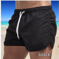 2024 Summer New Men's Shorts Beach Swimming Surfing Fast Drying Breathable Leisure Slow Running Fitness Loose Sports Shorts. 