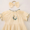 Summer female infant apricot sun print short-sleeved triangle Romper and bow headgear two-piece set. 