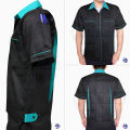 Mechanic's shirt, short-sleeved shop, black background, color, standard fabric, durable texture. 