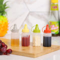 4Pcs Mini Tomato Ketchup Bottle Portable Sauce Salad Squeeze Bottle Small Bento Seasoning Box Storage Kitchen Accessories. 