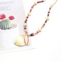 Bohemian beads long pendant mala with metal leaf summer jewelry. 