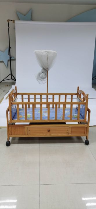 Baby%20Compact%20Folding%20Wooden%20Window%20Crib%20with%20Safety%20Gate,%20Natural%20-%20Image%209