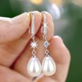 Huitan White Imitation Pearl Dangle Earrings for Women Temperament Bridal Wedding Ear Accessories Anniversary New Jewelry.
