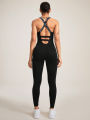 Seamless Women's Yoga Jumpsuits Racerback Strappy Back Athletic One-Piece Bodysuits for Gym & Workout Activewear.