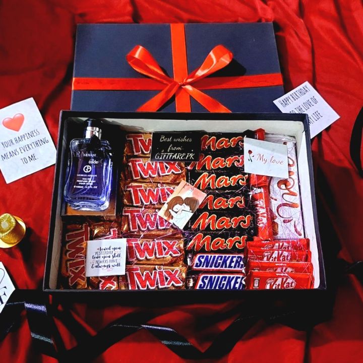 Gift box of chocolates and perfume