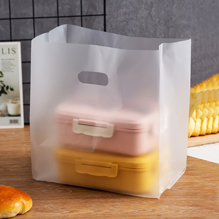 50pcs%20Transparent%20Plastic%20Gift%20Bags%20with%20Handles%20-%20Ideal%20for%20Salads,%20Cakes,%20Pizza,%20Bread,%20Desserts,%20Cookies,%20and%20Candy%20-%20Image%206