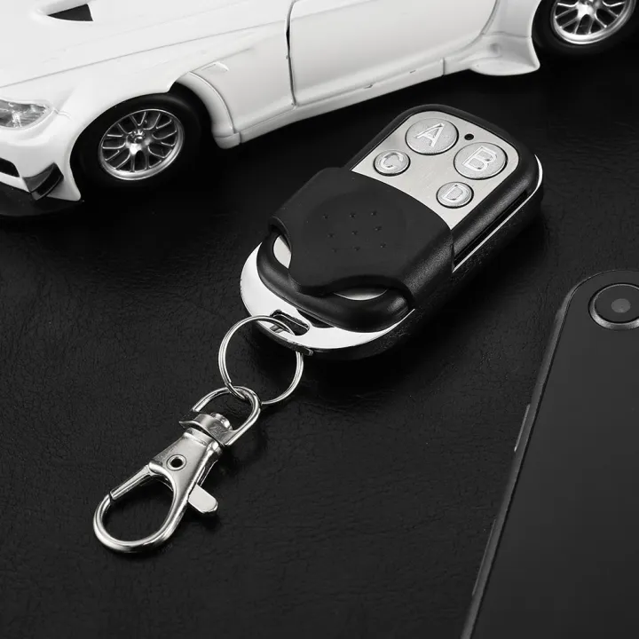 Universal%204%20Buttons%20Garage%20Door%20Opener%20Remote%20Control%20433MHz%20Clone%20Fixed%20Learning%20Rolling%20Code%20Duplicator%20Garage%20Metal%20Remote%20-%20Image%204
