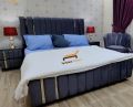 Stylish wooden vertical brass velvet bed, furniture factory. 