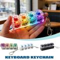 RGB Backlit Mechanical Keyboard Keychain Fidget Toy Release Stress Portable Stress Relief For Gamers And Adults.