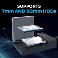 USB 3.0 to SATA External Hard Drive Lay-Flat Docking Station (model EC-DFFN or similar) with a WUSB 3.0 to SATA External Hard Drive Lay-Flat Docking Station (model EC-DFFN or similar) with a W-t-ern Digestern Digital (W-D) Green 14TB hard drive inserted. .