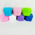 Polident denture box and regular denture box. 