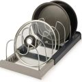 1Pc 7-grid Telescopic Pot Rack,Pans Organizer,Space-saving Cabinet Holder for Pots,Pans and Lids-Keep Your Kitchen Neat and Tidy. 