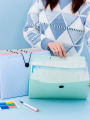 1 student file folder with cute transparent accordion style storage bag with 5 compartments for organizing tools. 