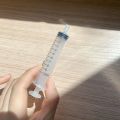 Precision 10ML Syringe Dispenser for Cosmetics and Fragrances - Leak-proof, clear measurement, ideal for precise water filling. 