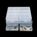 A plastic storage box with 12/14 adjustable dividers - suitable for storing jewelry, DIY crafts, small tools, and some candies. 
