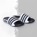 Stridez Classic Triple-Line Slides – Black & White Edition.