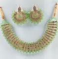Tea pink colour artificial jewellery set of round crystal earrings and chowker neckless for girls and woman for weddngs paties and eid festivals in low price. 