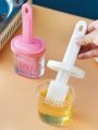 Silicone Oil Bottle with Silicone Brush. 