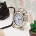 1 piece of dollhouse miniature metal alarm clock: 1/12 mini simulation bedroom scene decoration model (sticker random).