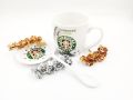 Starbucks mug with spoon and top. 