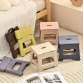 1pc Portable folding stool for outdoor adventures - durable plastic, ideal for travel and home use.