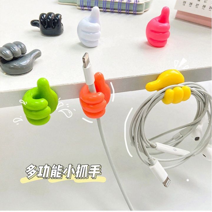 2%20pcs%20Thumb-operated%20hook%20hub,%20creative%20and%20cute,%20for%20organizing%20and%20securing%20data%20cables,%20a%20non-permanent,%20adhesive%20hook%20that%20doesn't%20require%20drilling%20holes%20-%20Image%203