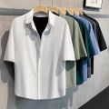 2024 New Summer Men Short-sleeved White Shirt Anti-wrinkle Solid Color Fashion Casual Loose Button Pocket Shirt Clothing Top. 