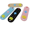 Baby silicone remote control teether baby anti-eating hand teething stick cartoon soothing teething toys cognitive teething toy. 