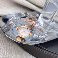 French Romantic Pearl Pull Cord Handheld Watch Elegant Small Fashion Bracelet Quartz Wristwatch Stylish Portable Timepiece. 