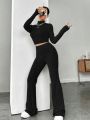 Stand Collar Navel T-shirt and Trumpet pants.