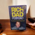 Rich Dad Poor Dad the # 1 personal finance book by Robert T KIYOSAKI. 