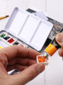 Bview Art Hot Selling Empty Watercolor Tins Palette Paint Case with 14pcs half pan. 